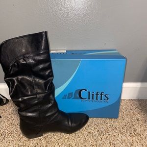 cliffs by mountain boots